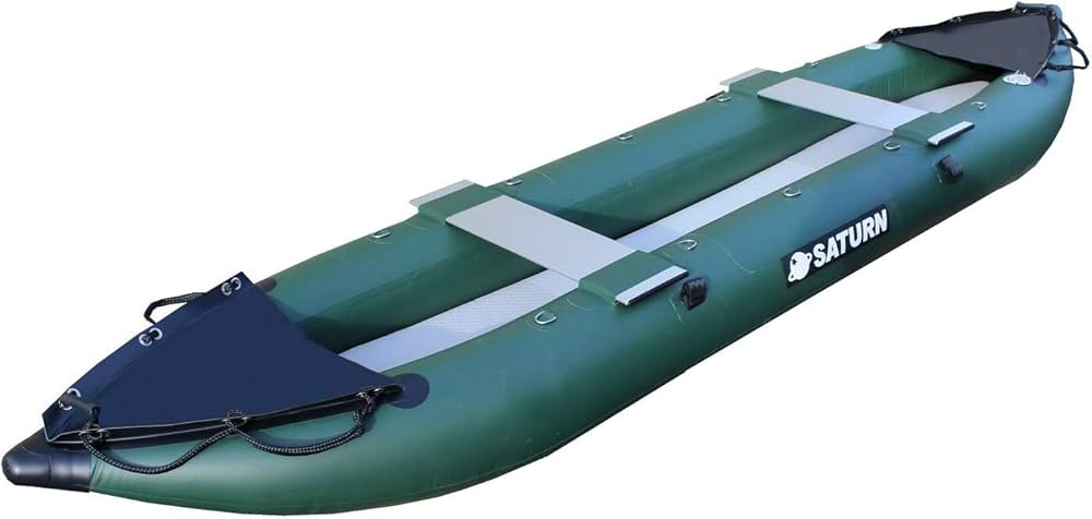 a close up of a green Saturn two person canoe